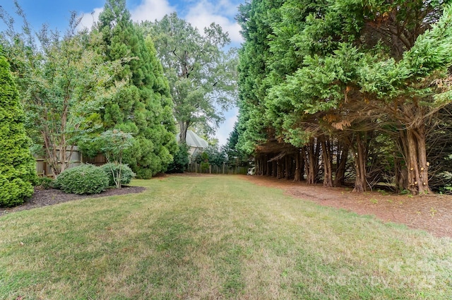 view of yard featuring fence