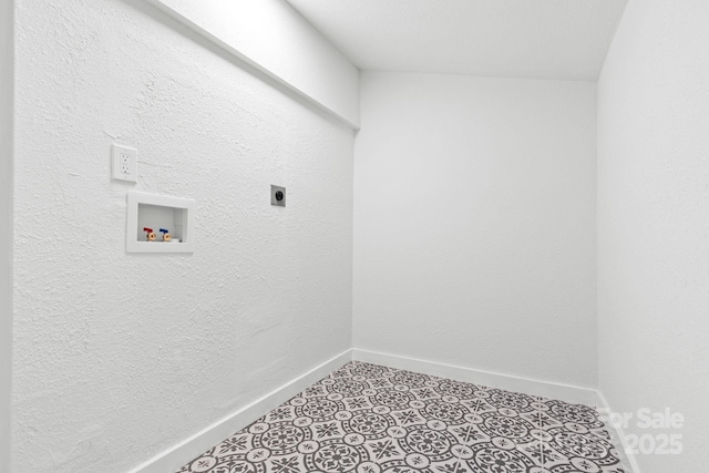 laundry room with laundry area, hookup for a washing machine, baseboards, and electric dryer hookup
