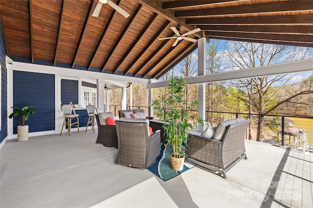 view of patio featuring an outdoor hangout area and ceiling fan