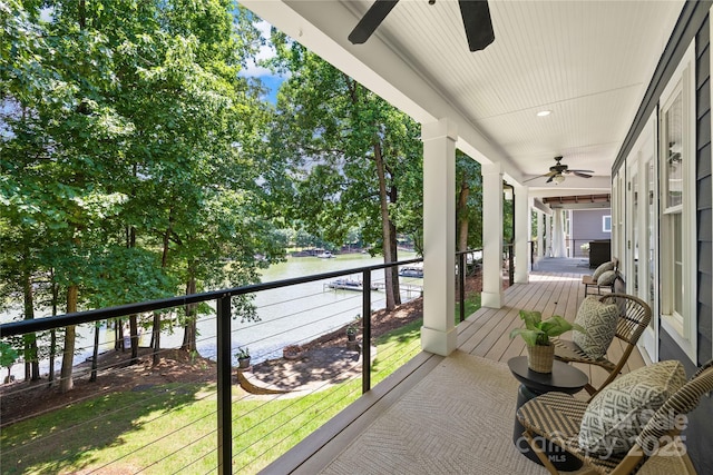 228 Wildwood Cove Dr, Mooresville, NC 28117 - balcony with ceiling fan and a water view