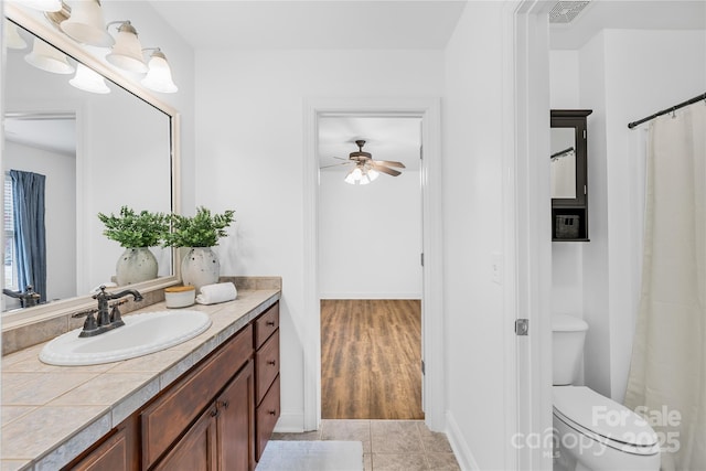 228 Wildwood Cove Dr, Mooresville, NC 28117 - bathroom with vanity, a ceiling fan, tile patterned floors, and a shower with shower curtain