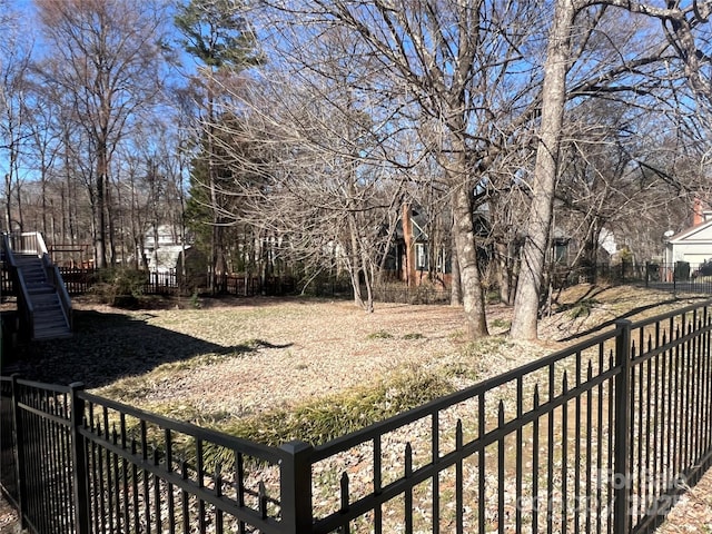 view of yard with fence