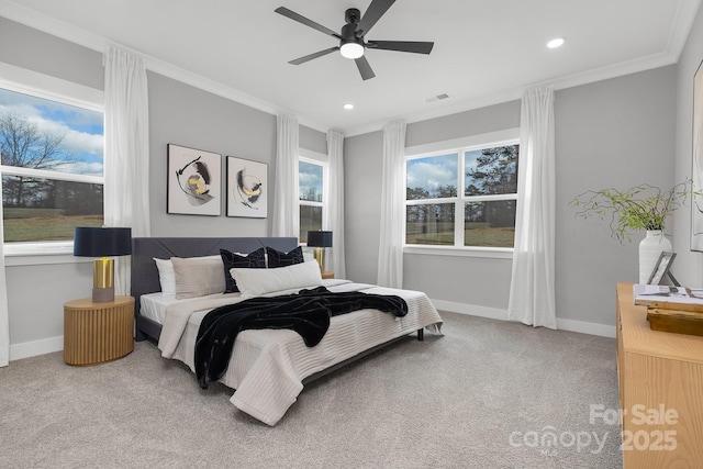 carpeted bedroom featuring recessed lighting, crown molding, and baseboards