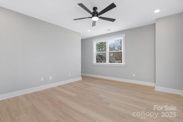 unfurnished room featuring ceiling fan, light wood-style flooring, recessed lighting, visible vents, and baseboards