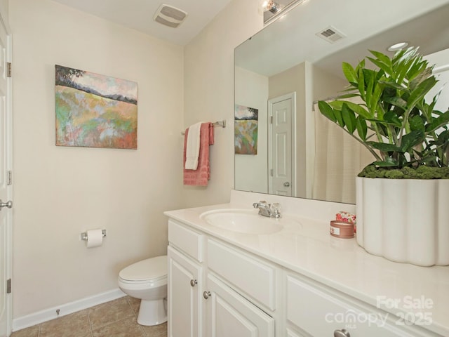 bathroom with tile patterned flooring, visible vents, baseboards, toilet, and vanity