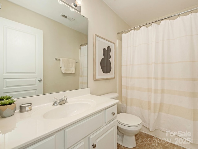 bathroom featuring tile patterned floors, visible vents, toilet, a shower with curtain, and vanity