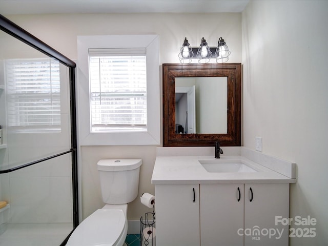 full bathroom with vanity and toilet