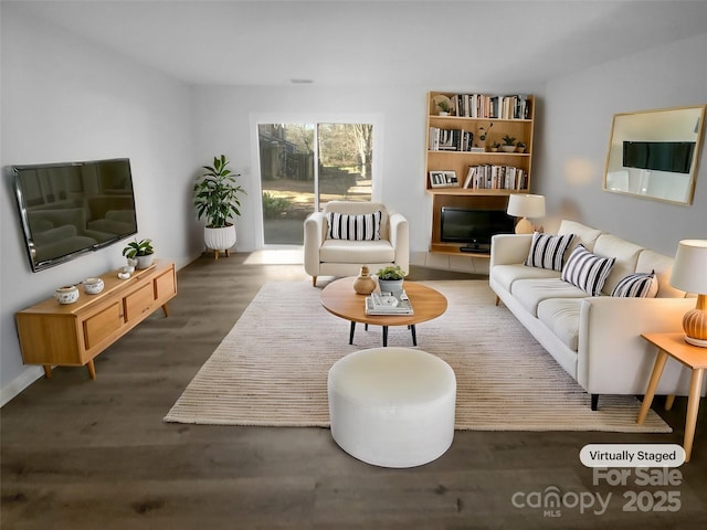 living area with dark wood finished floors