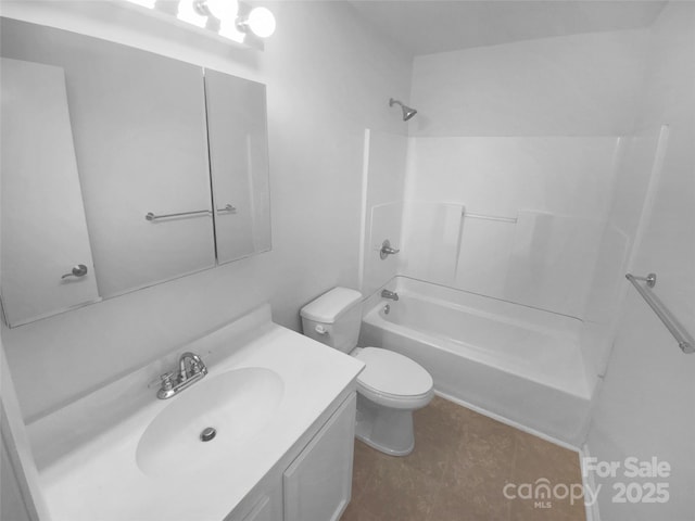 full bathroom with tub / shower combination, vanity, and toilet