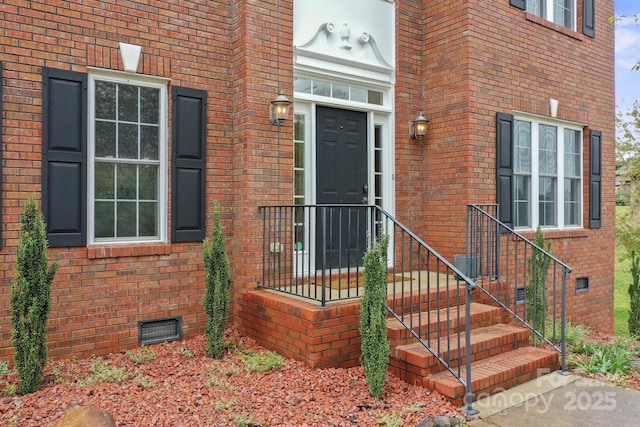 1919 46th Avenue Dr NE Unit 46, Hickory, NC 28601 - doorway to property featuring crawl space, brick siding, and central AC