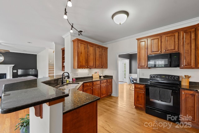 1919 46th Avenue Dr NE Unit 46, Hickory, NC 28601 - kitchen with black appliances, a sink, crown molding, light wood-style floors, and dark stone counters