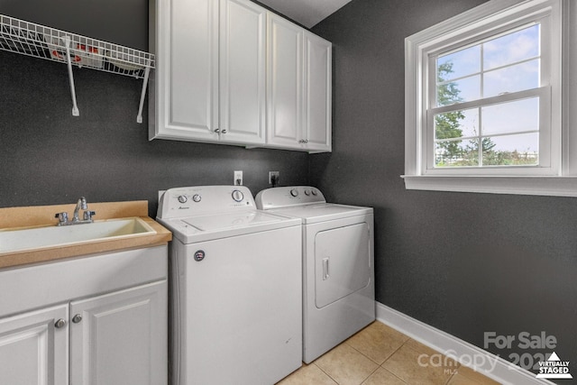 1919 46th Avenue Dr NE Unit 46, Hickory, NC 28601 - washroom with cabinet space, separate washer and dryer, baseboards, and light tile patterned floors
