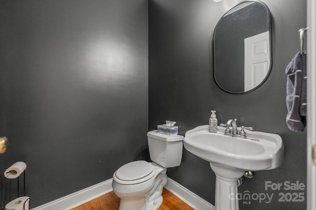 1919 46th Avenue Dr NE Unit 46, Hickory, NC 28601 - half bath featuring baseboards, wood finished floors, and toilet