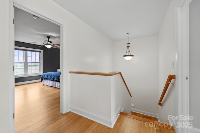 1919 46th Avenue Dr NE Unit 46, Hickory, NC 28601 - stairs featuring wood finished floors, baseboards, and a ceiling fan