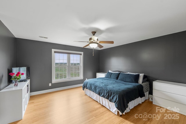 1919 46th Avenue Dr NE Unit 46, Hickory, NC 28601 - bedroom with light wood-style flooring, baseboards, and ceiling fan