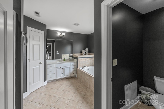 1919 46th Avenue Dr NE Unit 46, Hickory, NC 28601 - bathroom featuring toilet, tile patterned flooring, vanity, and a bath