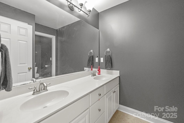 1919 46th Avenue Dr NE Unit 46, Hickory, NC 28601 - full bathroom featuring toilet, tile patterned floors, baseboards, and double vanity