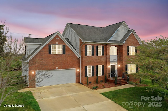 1919 46th Avenue Dr NE Unit 46, Hickory, NC 28601 - colonial-style house featuring brick siding, a garage, driveway, and a shingled roof
