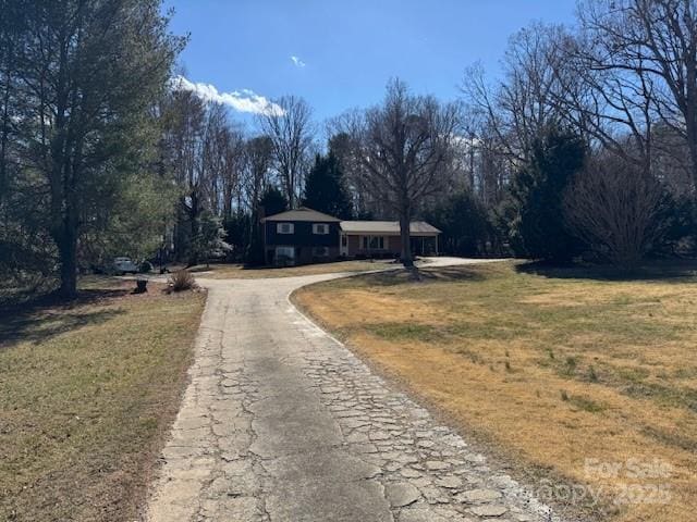 view of road featuring driveway