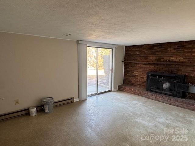 unfurnished living room with a baseboard radiator, a brick fireplace, a textured ceiling, concrete floors, and baseboards