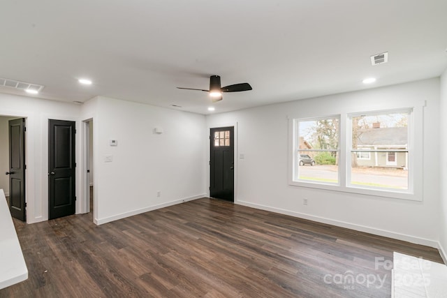 209 Palmer St, Shelby, NC 28150 - empty room with baseboards, visible vents, dark wood-type flooring, and recessed lighting