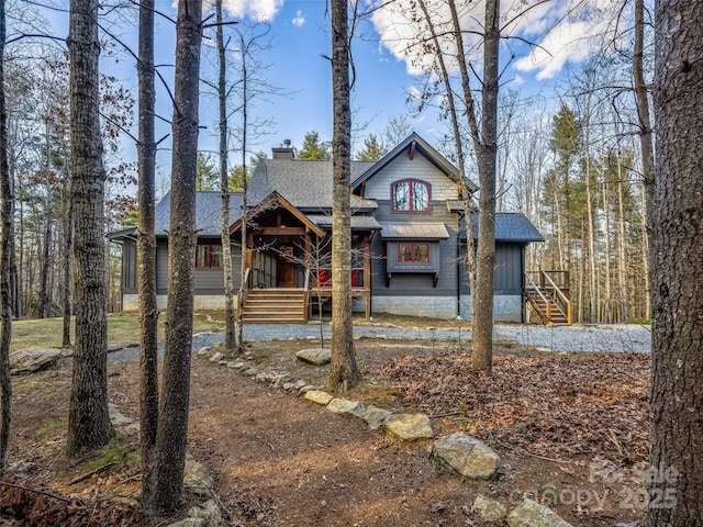 103 Duck Hope Dr, Hendersonville, NC 28739 - view of front facade featuring a shingled roof, a chimney, and board and batten siding
