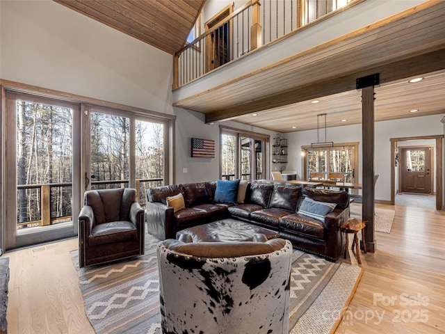 103 Duck Hope Dr, Hendersonville, NC 28739 - living area with light wood finished floors, a towering ceiling, wood ceiling, beam ceiling, and recessed lighting