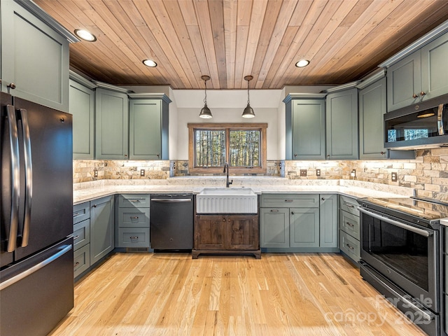 103 Duck Hope Dr, Hendersonville, NC 28739 - kitchen with appliances with stainless steel finishes, a sink, wood ceiling, and light wood-style floors