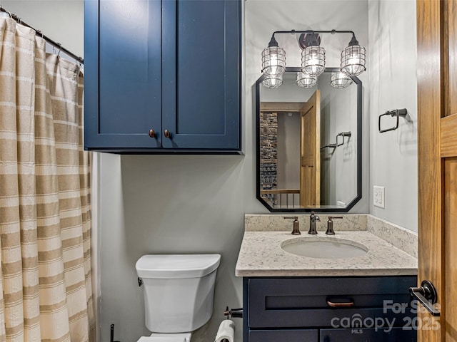 103 Duck Hope Dr, Hendersonville, NC 28739 - bathroom featuring a shower with shower curtain, vanity, and toilet