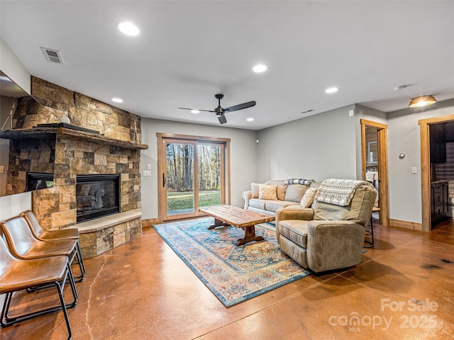 103 Duck Hope Dr, Hendersonville, NC 28739 - living room featuring finished concrete flooring, recessed lighting, visible vents, and a stone fireplace
