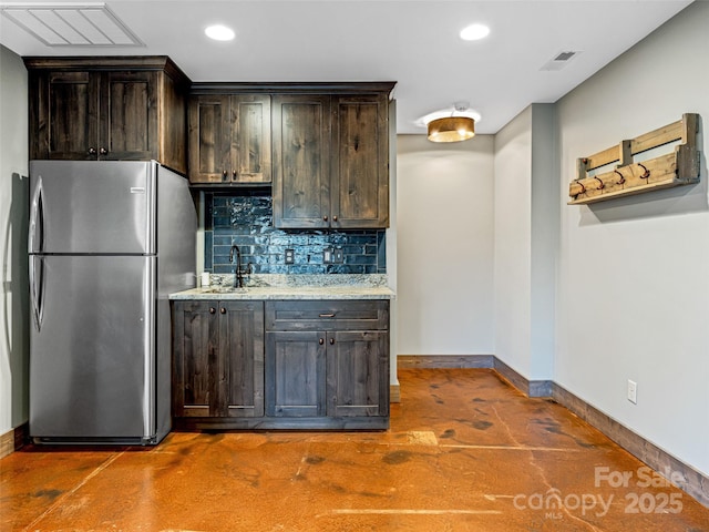 103 Duck Hope Dr, Hendersonville, NC 28739 - kitchen with recessed lighting, a sink, baseboards, freestanding refrigerator, and decorative backsplash