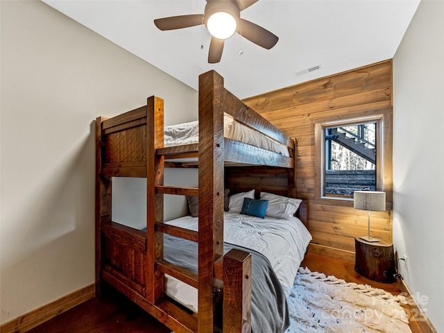 103 Duck Hope Dr, Hendersonville, NC 28739 - bedroom featuring wood walls, baseboards, visible vents, and a ceiling fan