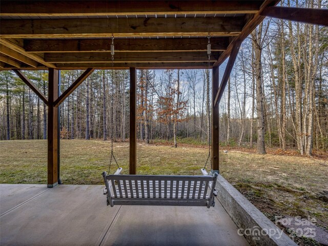 103 Duck Hope Dr, Hendersonville, NC 28739 - view of patio featuring a wooded view