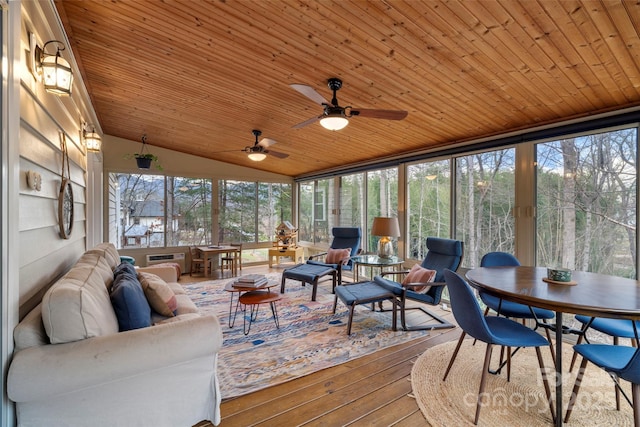 sunroom featuring wood ceiling and vaulted ceiling