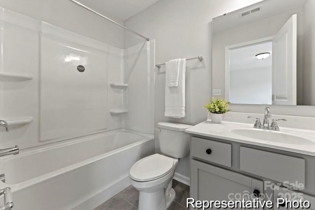 full bathroom featuring shower / bathtub combination, visible vents, toilet, vanity, and tile patterned floors