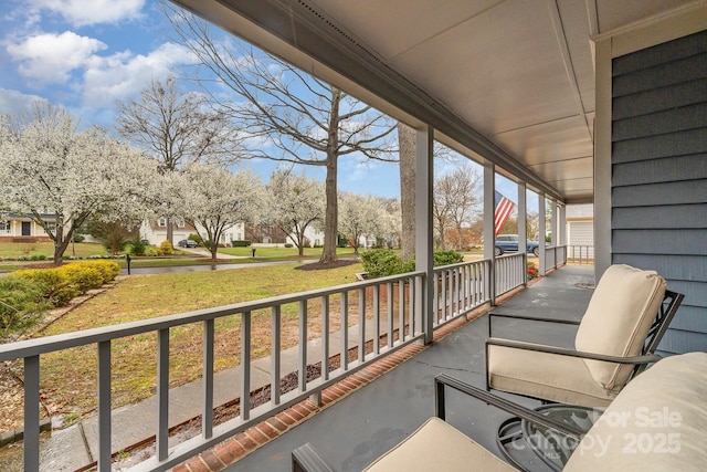 balcony featuring a porch