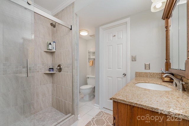 full bathroom with vanity, a shower stall, toilet, and tile patterned floors