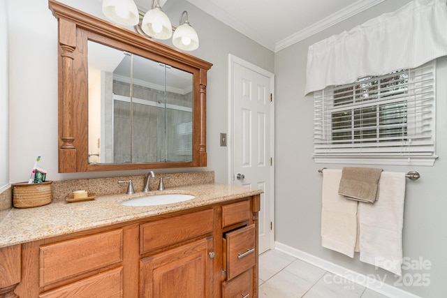 bathroom featuring vanity, crown molding, and tile patterned floors