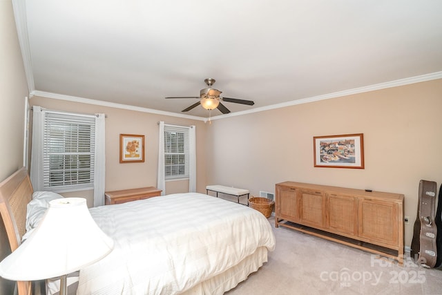 bedroom featuring light carpet, visible vents, and crown molding