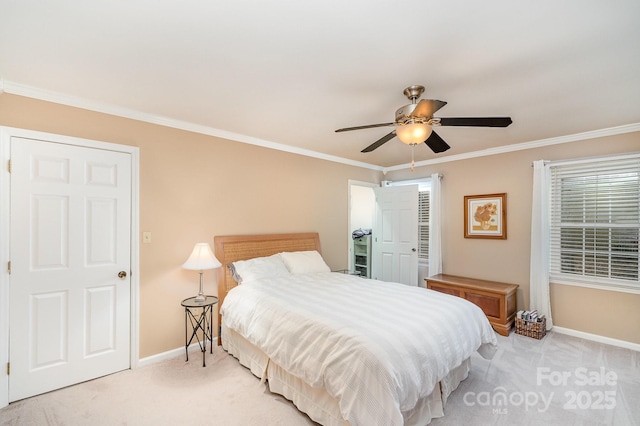 bedroom with a ceiling fan, baseboards, light colored carpet, and crown molding