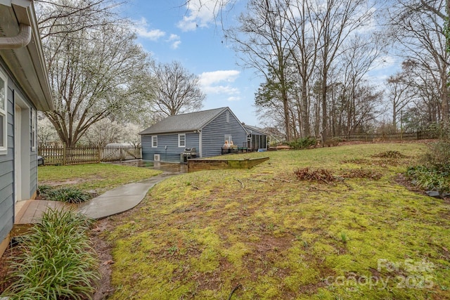 view of yard with fence