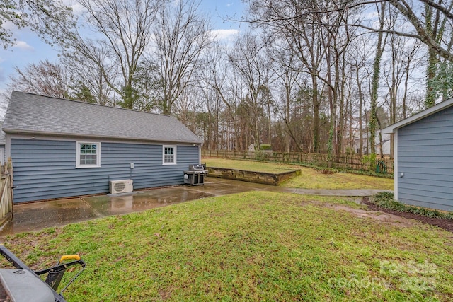 view of yard featuring a patio area and fence