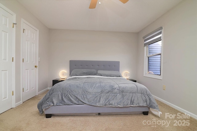 bedroom with carpet, a ceiling fan, and baseboards