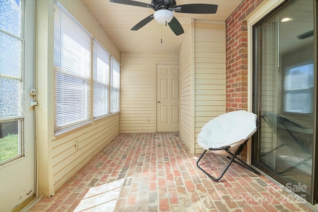 sunroom / solarium with a healthy amount of sunlight