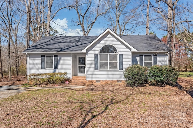 ranch-style home featuring crawl space, a shingled roof, and entry steps