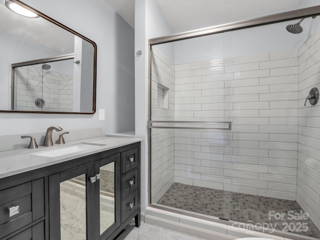 232 Stonebrook Dr, Hendersonville, NC 28791 - full bath featuring a stall shower, marble finish floors, and vanity