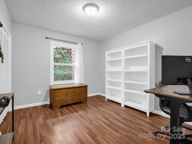 232 Stonebrook Dr, Hendersonville, NC 28791 - unfurnished office with wood finished floors, a textured ceiling, and baseboards