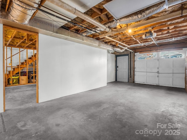 232 Stonebrook Dr, Hendersonville, NC 28791 - garage featuring a garage door opener