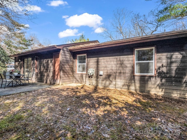 232 Stonebrook Dr, Hendersonville, NC 28791 - back of property with a patio area