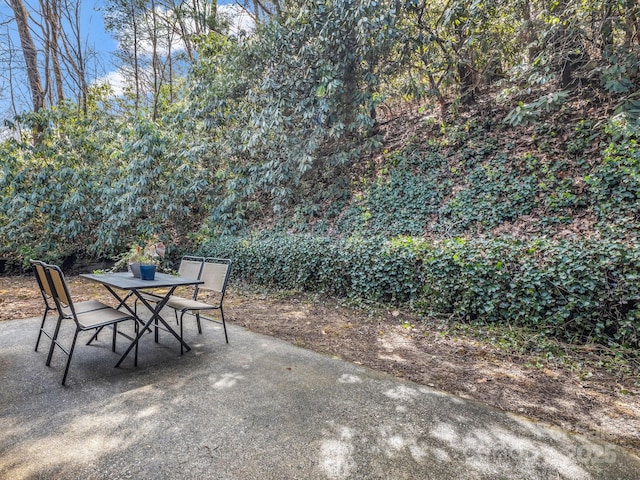 232 Stonebrook Dr, Hendersonville, NC 28791 - view of patio / terrace featuring outdoor dining area